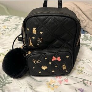 Under One Sky Black Quilted Backpack with Gold Accents